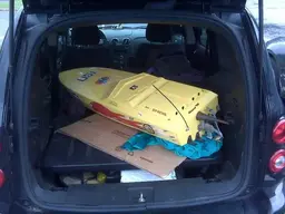 Apache in back of car.webp