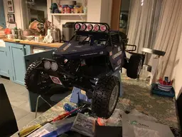 49975