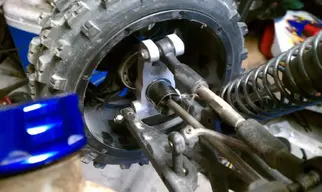 Rear Knuckle Inside With Tire.webp Rear Knuckle Inside With Tire.webp